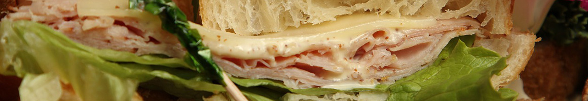 Eating Mediterranean Sandwich at M&M Bistro restaurant in Joplin, MO.